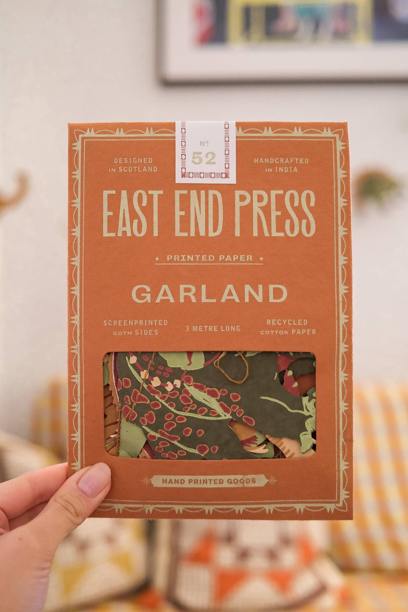 East End Press Dinosaur Garland with 10 colourful hand-printed dinosaurs on recycled paper, 3 metres long.