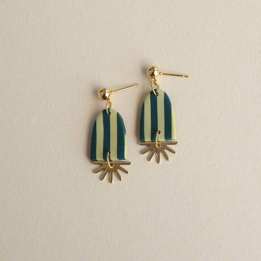 Pepper You design and hand craft each pair of these earrings using pigmented clay and recycled brass charms. The gold plated nickel free earring posts ensure both style and comfort while the ultra lightweight clay makes these earrings so light, you wont even remember you're wearing them until someone compliments you on your earrings!

A fun, eye catching and colourful addition to any outfit. Choose from: Chocolate &amp; Lilac / Emerald &amp; Apple Green Charm Drop: 3.5cm