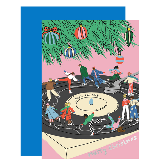 Jingle Bell Rock Christmas card with ice-skating scene and gold foil accents, printed on sustainably sourced UK paper.