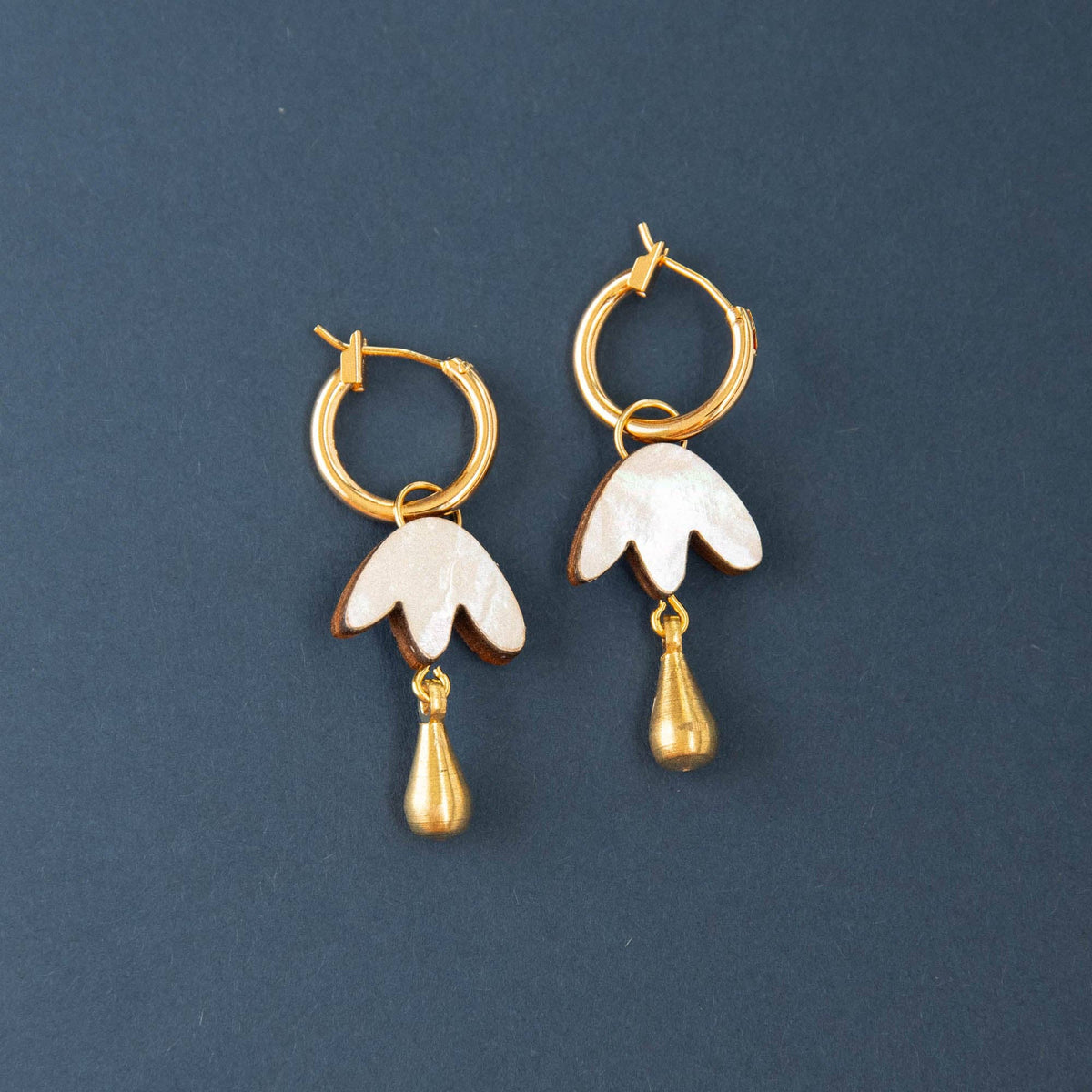 Petal drop hoop earrings presented in recyclable gift box