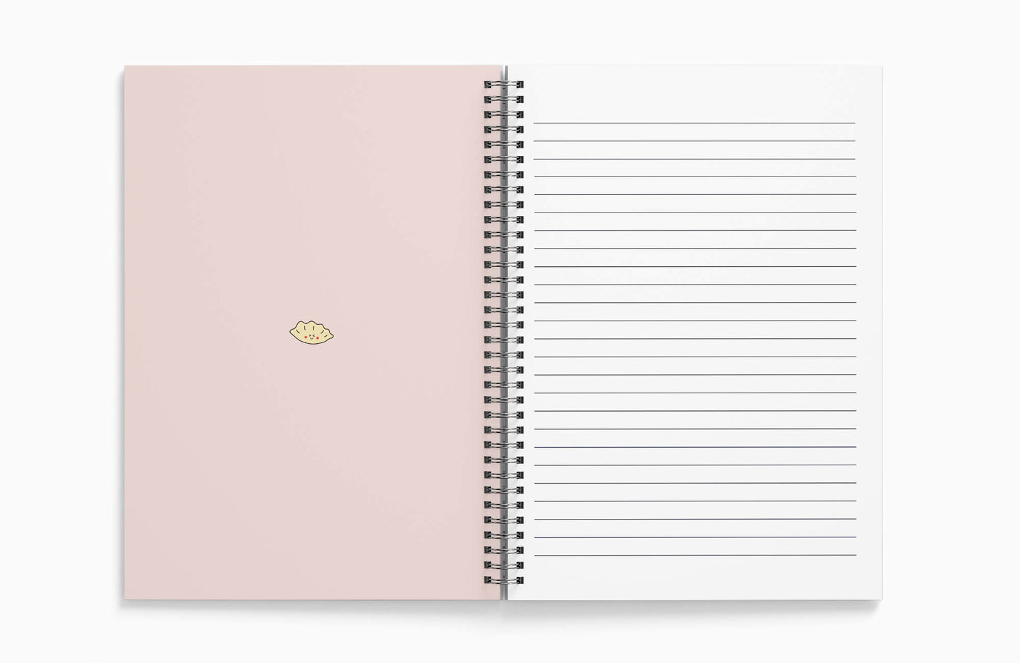Detailed view of the gyoza design on a textured notebook cover