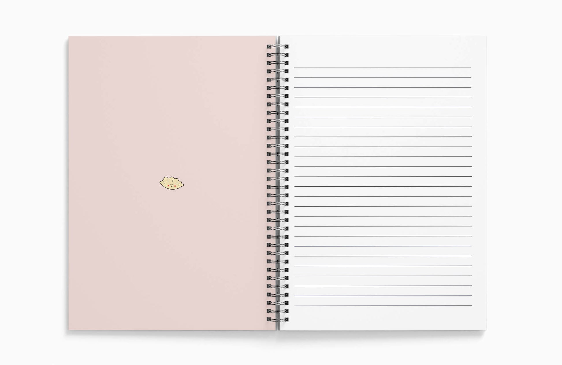 Detailed view of the gyoza design on a textured notebook cover