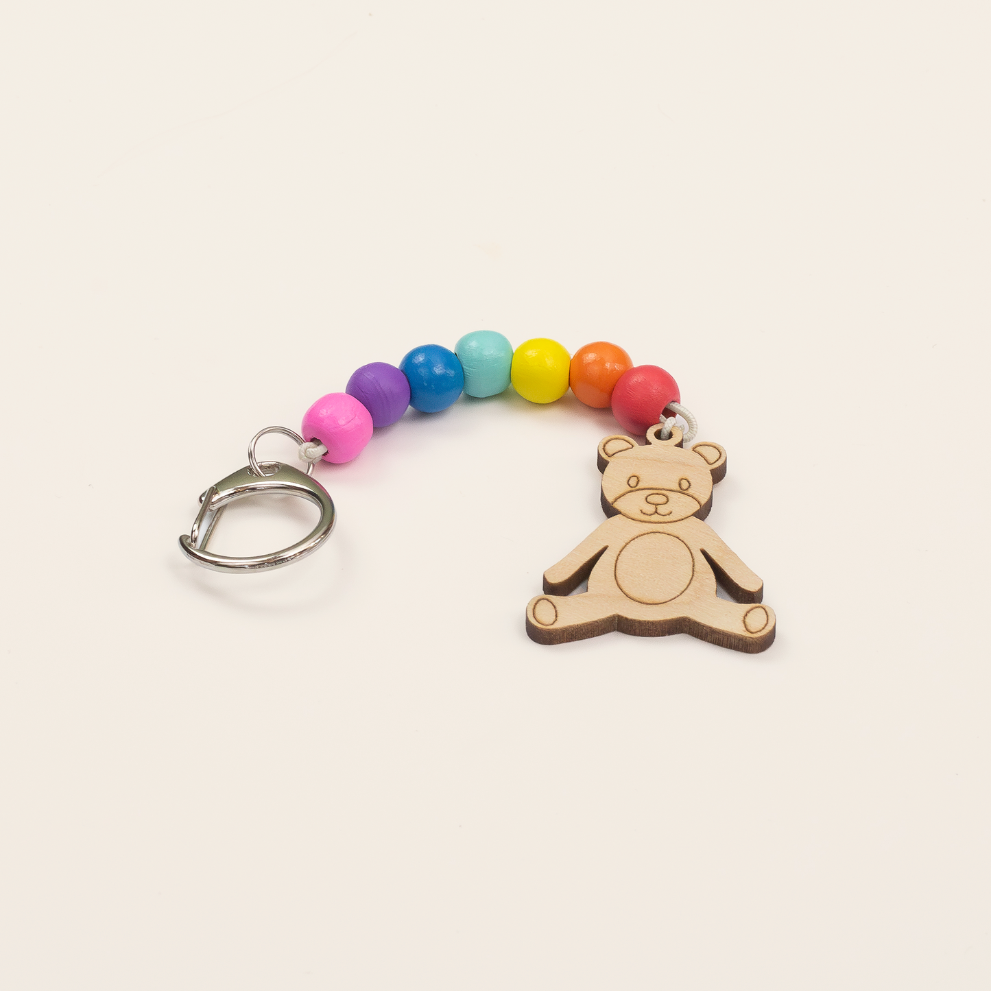 Sustainably sourced wooden beads and teddy bear fob components