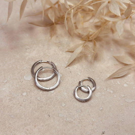 Close-up of Brushed Silver Minimal Hoops with Hinged Fitting