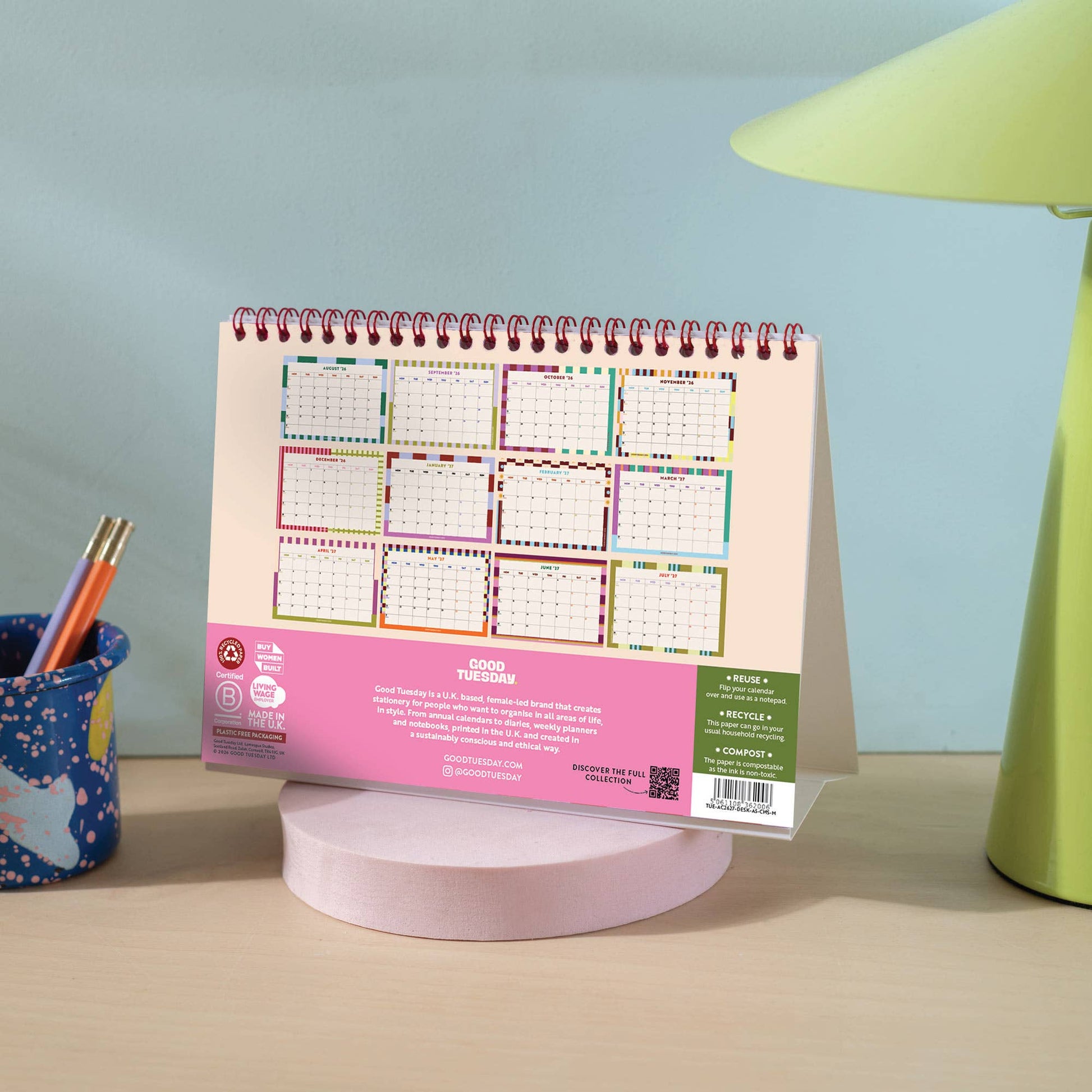 Back view of the 2026-2027 academic desk calendar on a wooden desk