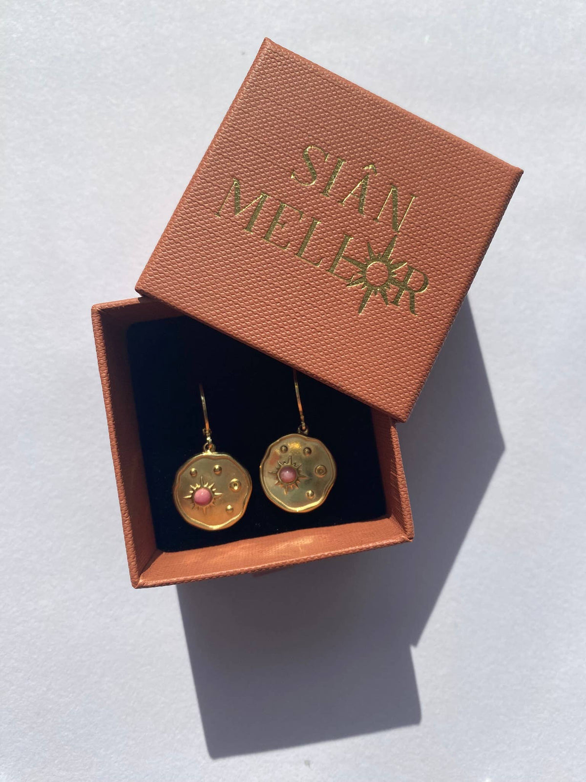 Celestial disk huggie hoop earrings with pink stone in gold