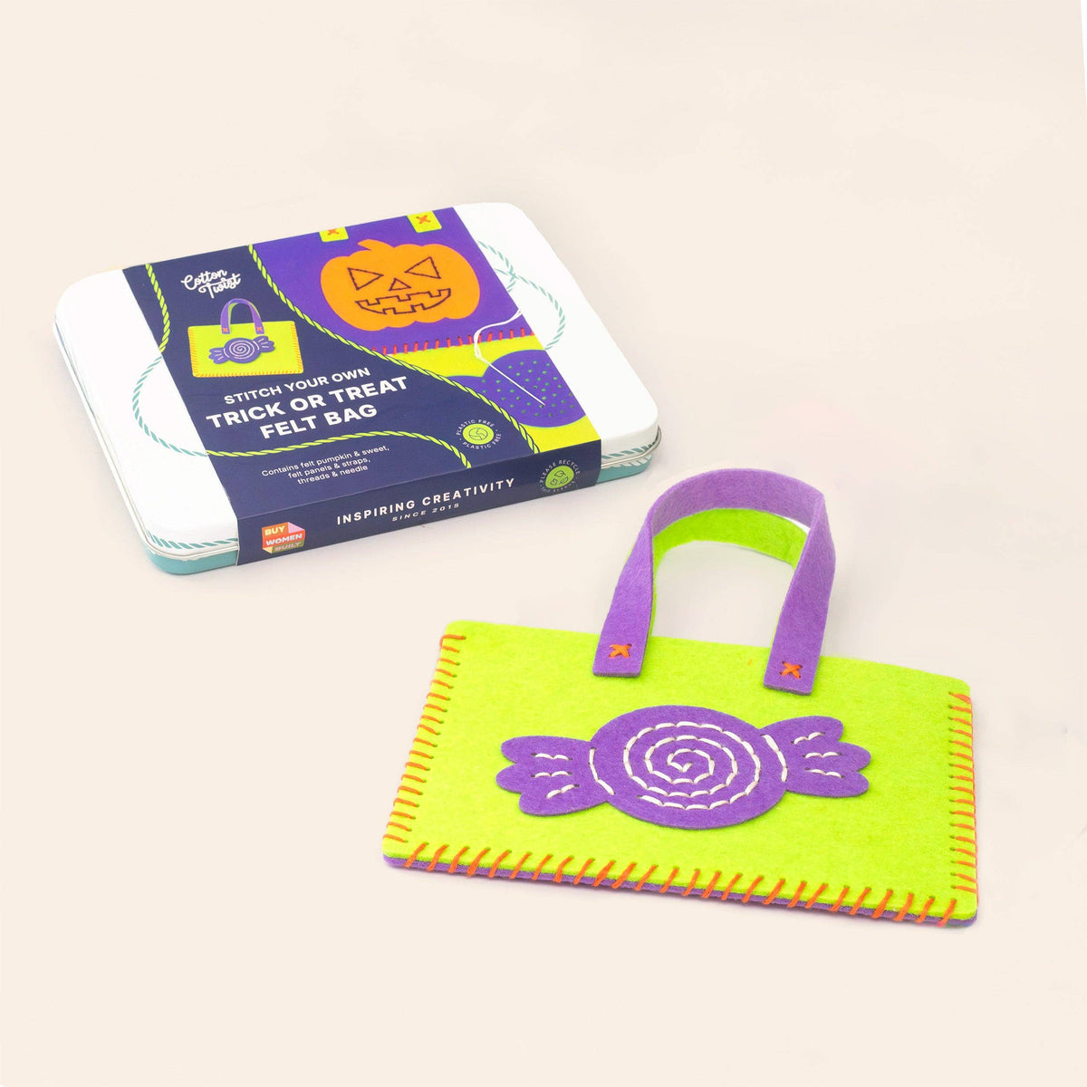 Kids Halloween craft activity kit being unpacked