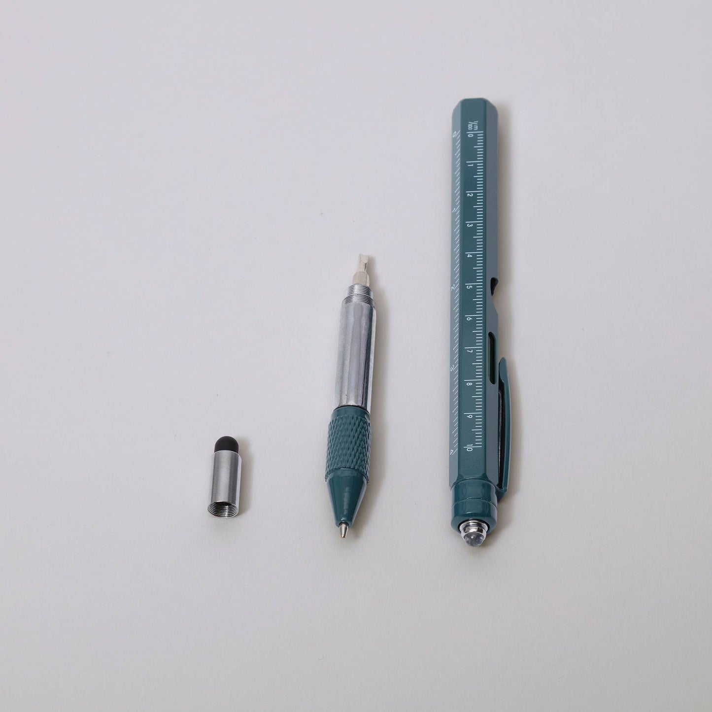 Close up of the bottle opener tool on the pen