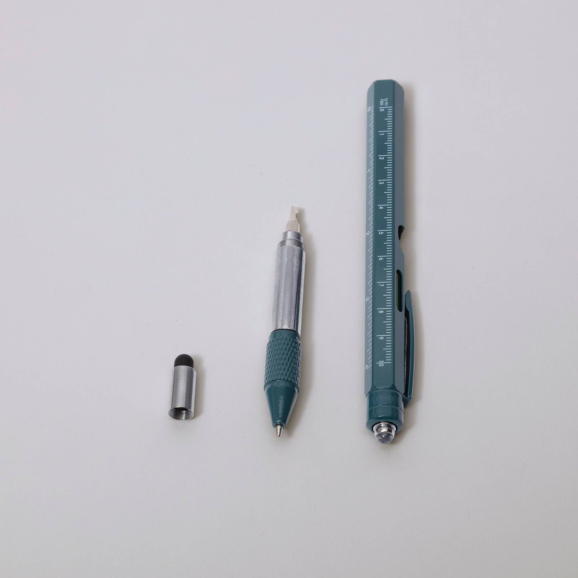 Close up of the bottle opener tool on the pen