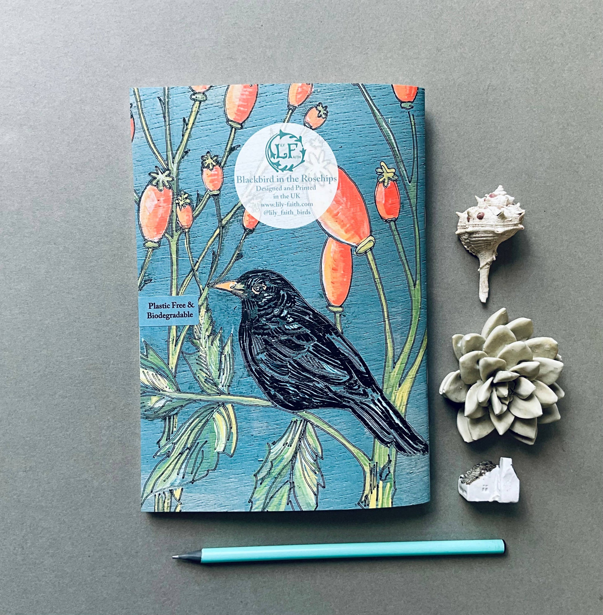 Lily Faith's etched and engraved Blackbird in the Rosehips illustration beautifully transposed onto a pocket sized A5 notebook. With a lovely weight to the centre pages, they are left blank for your thoughts and drawings to take life.