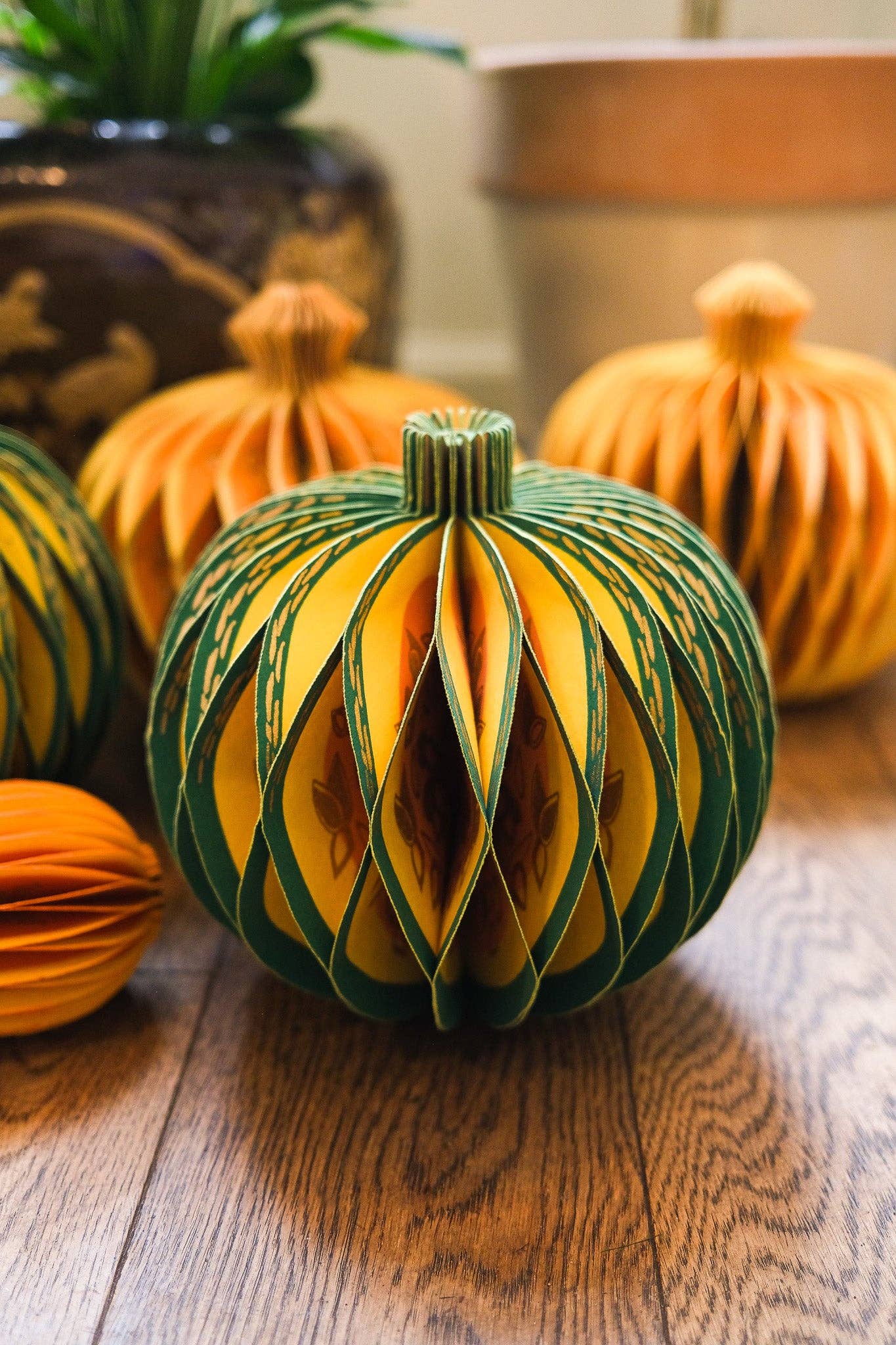 Recycled cotton paper gourd honeycomb decoration with cotton hanging loop, eco-friendly ornament.
