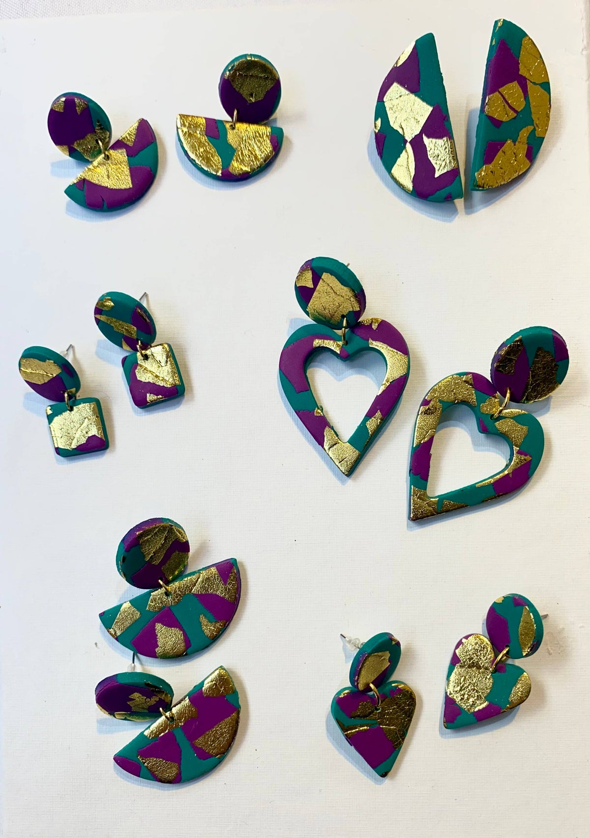 Handcrafted Heather half moon earrings with gold accents