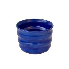Handcrafted Ripple Beaker in Blue. Handcrafted from stoneware clay, this colourful ceramic beaker with distinctive ripple texture is ideal for your morning coffee, a wine with friends or even a good old cup of water. The quirky rippled form provides a playful aesthetic whilst also being extremely ergonomic to hold, perfect for slotting your fingers comfortably into the grooves. 7 cm high and 9cm wide at the rim.
