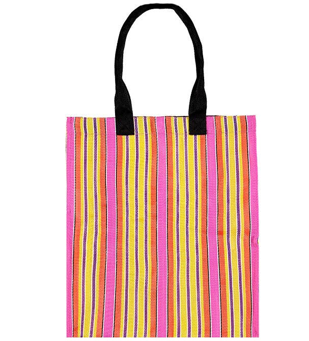 Eco Woven Market Shopper in Neyron, Guardsman and Pearl. A colourful, sustainable shopper with sturdy handles and a magnetic popper closure. This bag is made from threads spun from recycling old cement sacks!