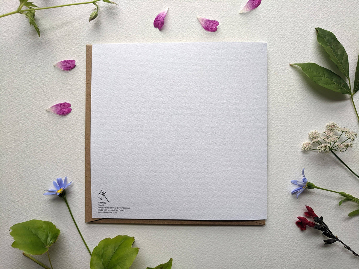 Back of blue tit bird greeting card showing eco-friendly details