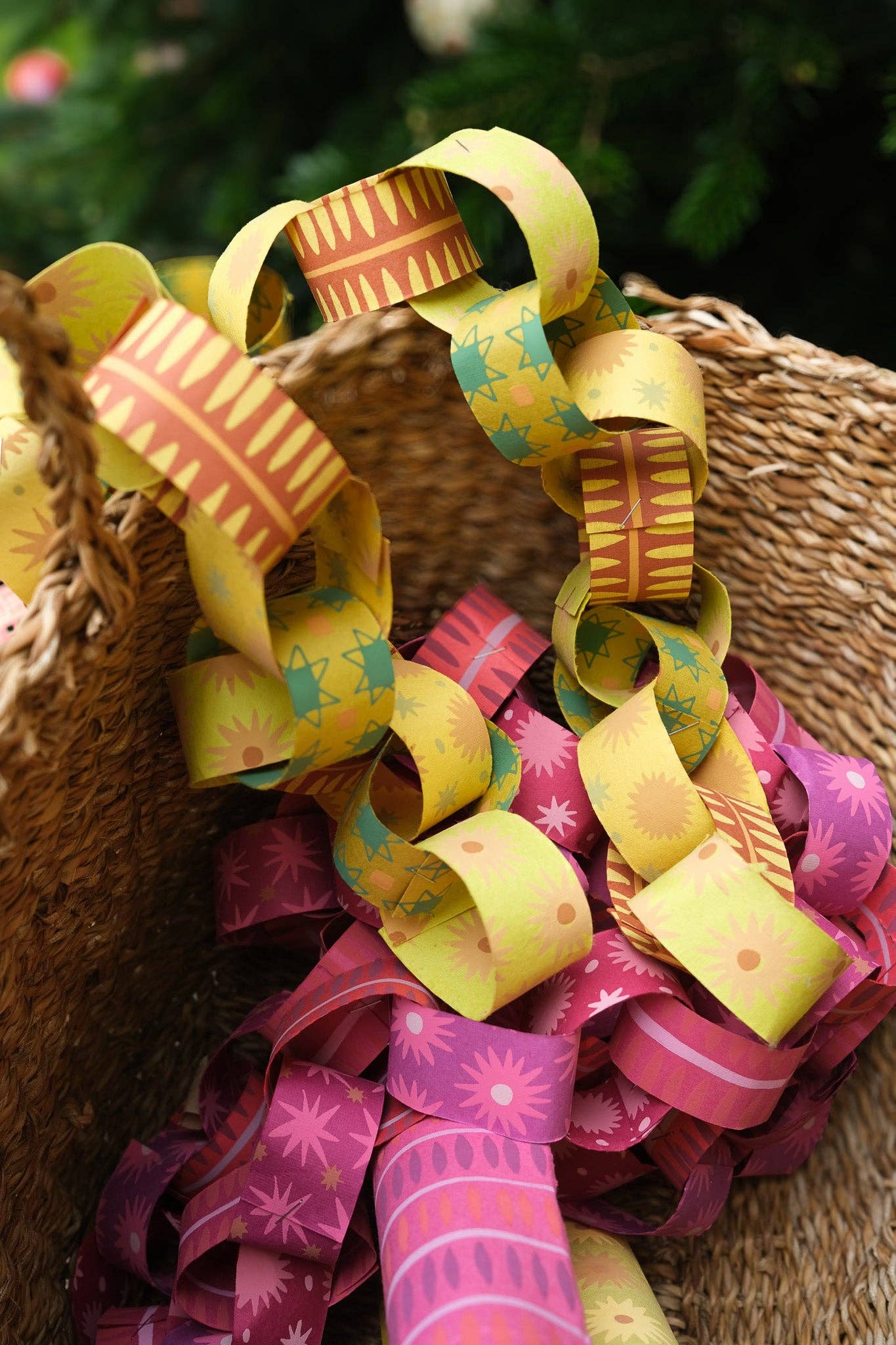 Single yellow patterned recycled paper chain strip