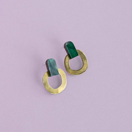 Each pair of these brass stud earrings is designed and handcrafted in Pepper You's studio from laser-cut wood, acrylic and brass. Stunning earrings for the party season.

Available in Teal or Aubergine.