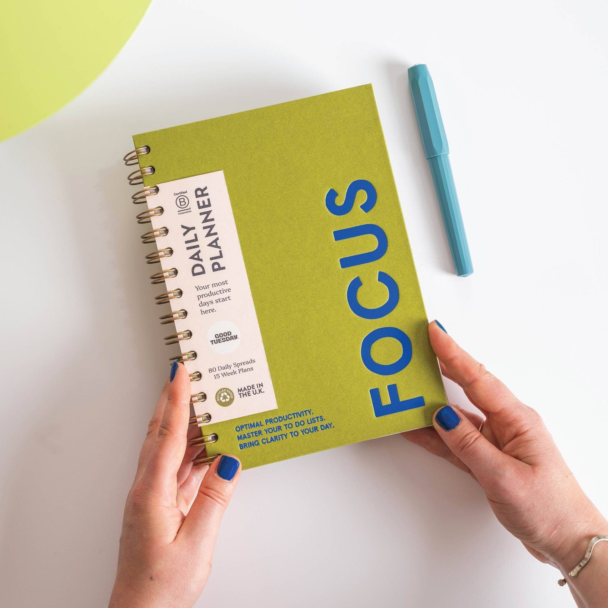 Matcha green undated daily productivity planner with navy typography