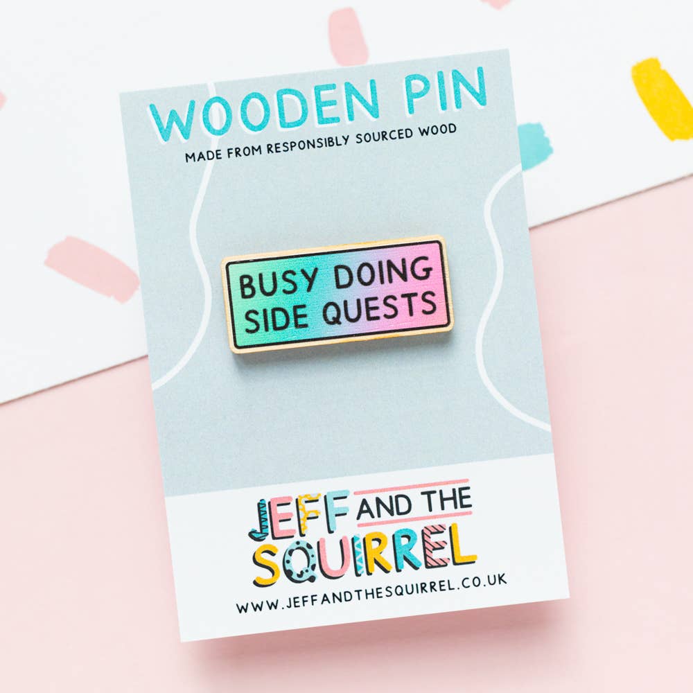 Close up of the sustainably sourced birch plywood pin for ADHD awareness