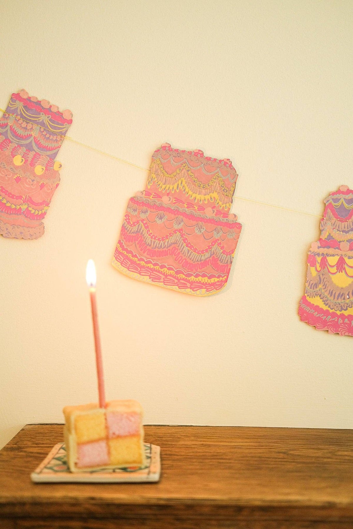 Hand printed frosted cake paper decorations