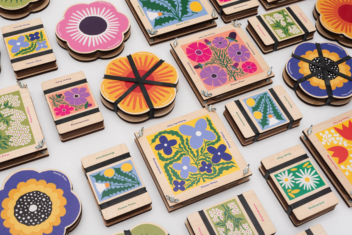 Flower press packaging in a cream board envelope box