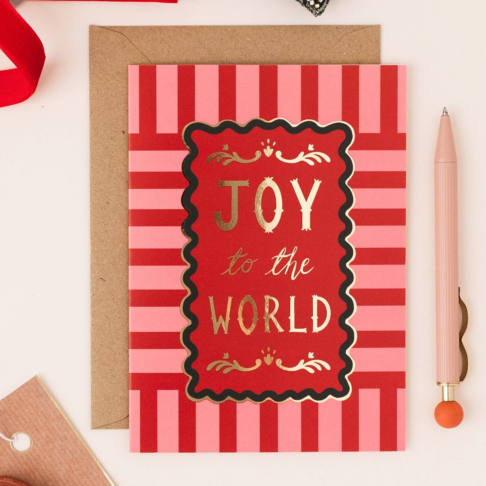 Close-up of gold foil detail on 'Joy to the World' modern stripe Christmas card