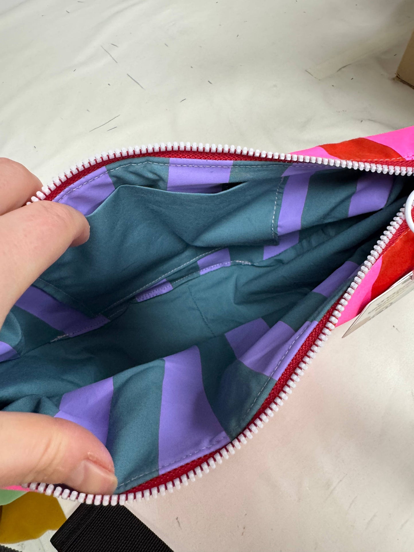 Handprinted Waxed Canvas Sling Bag, showing adjustable strap and buckle