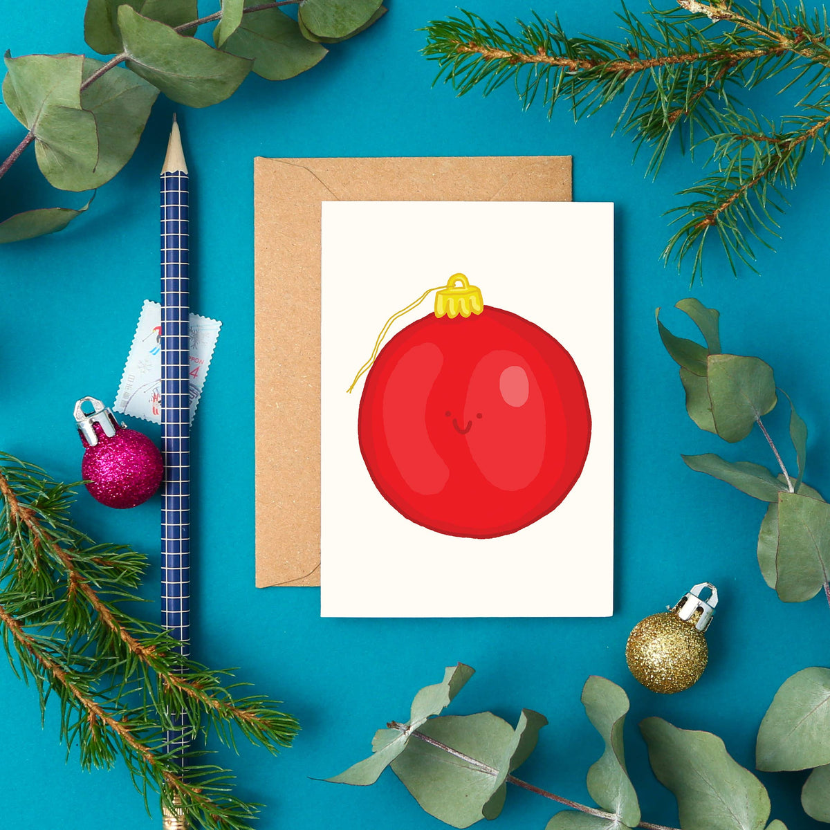 A7 mini Christmas card with a red bauble and kraft envelope