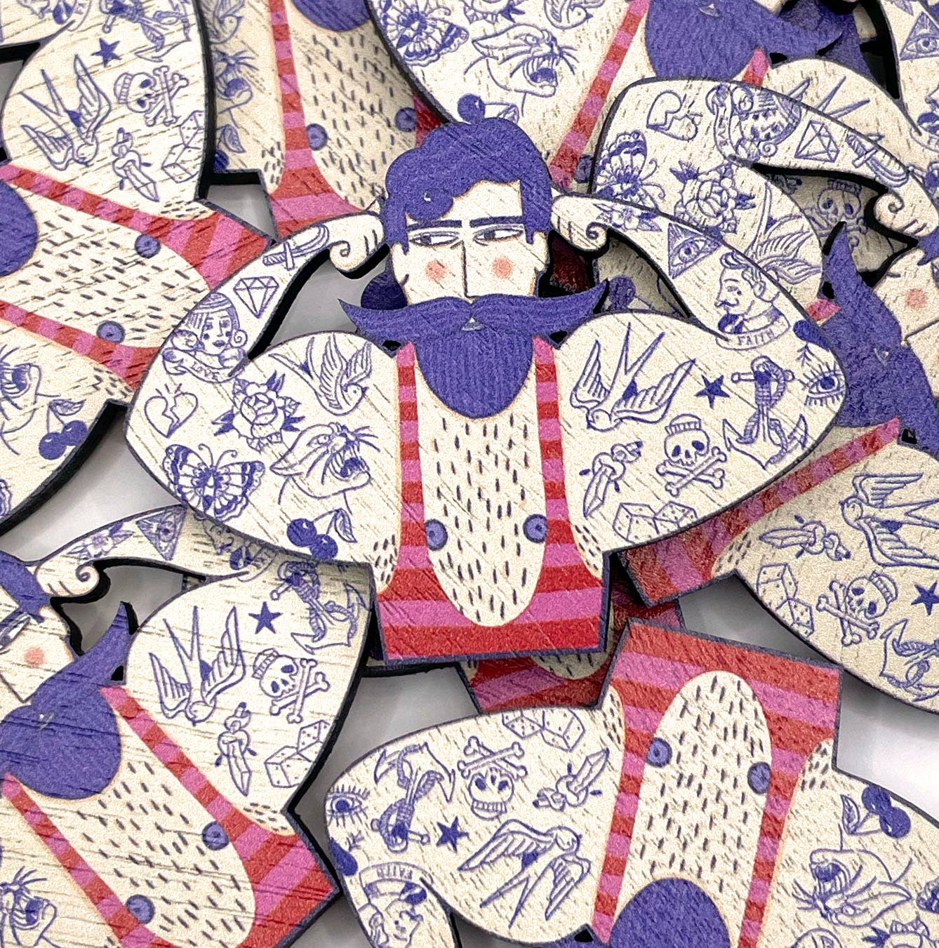 Circus strongman wooden pin brooch showing laser cut detail