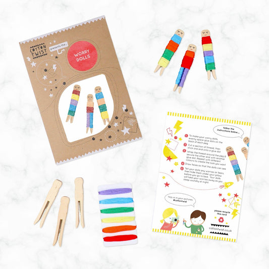 Cotton Twist Make Your Own Worry Dolls Kit with wooden pegs, cotton threads, and glue dots