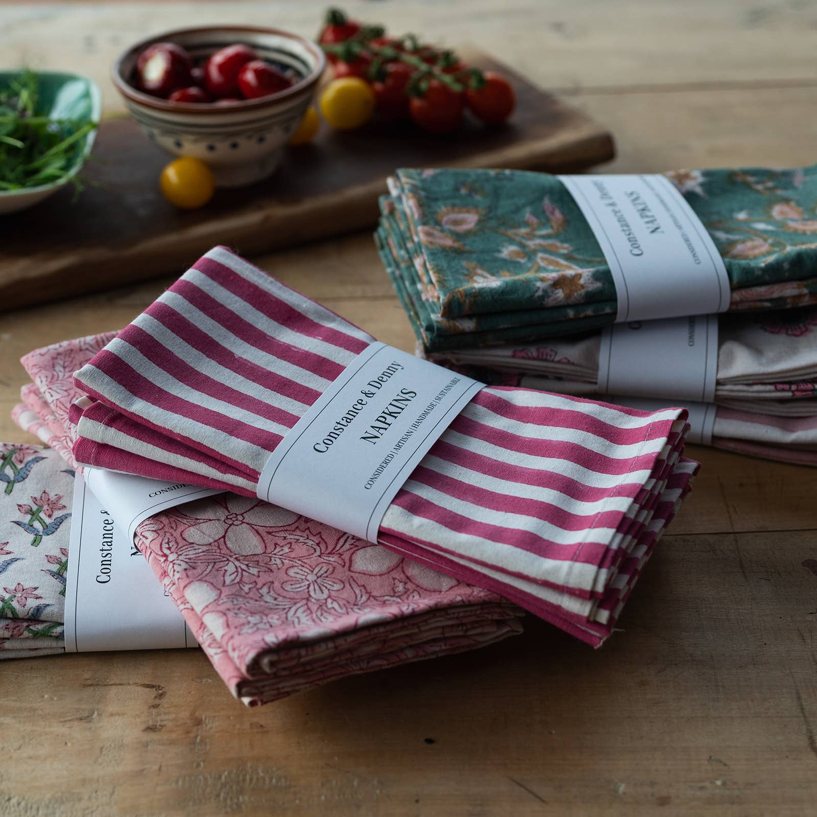 Artisanal table setting with rose botanical napkins