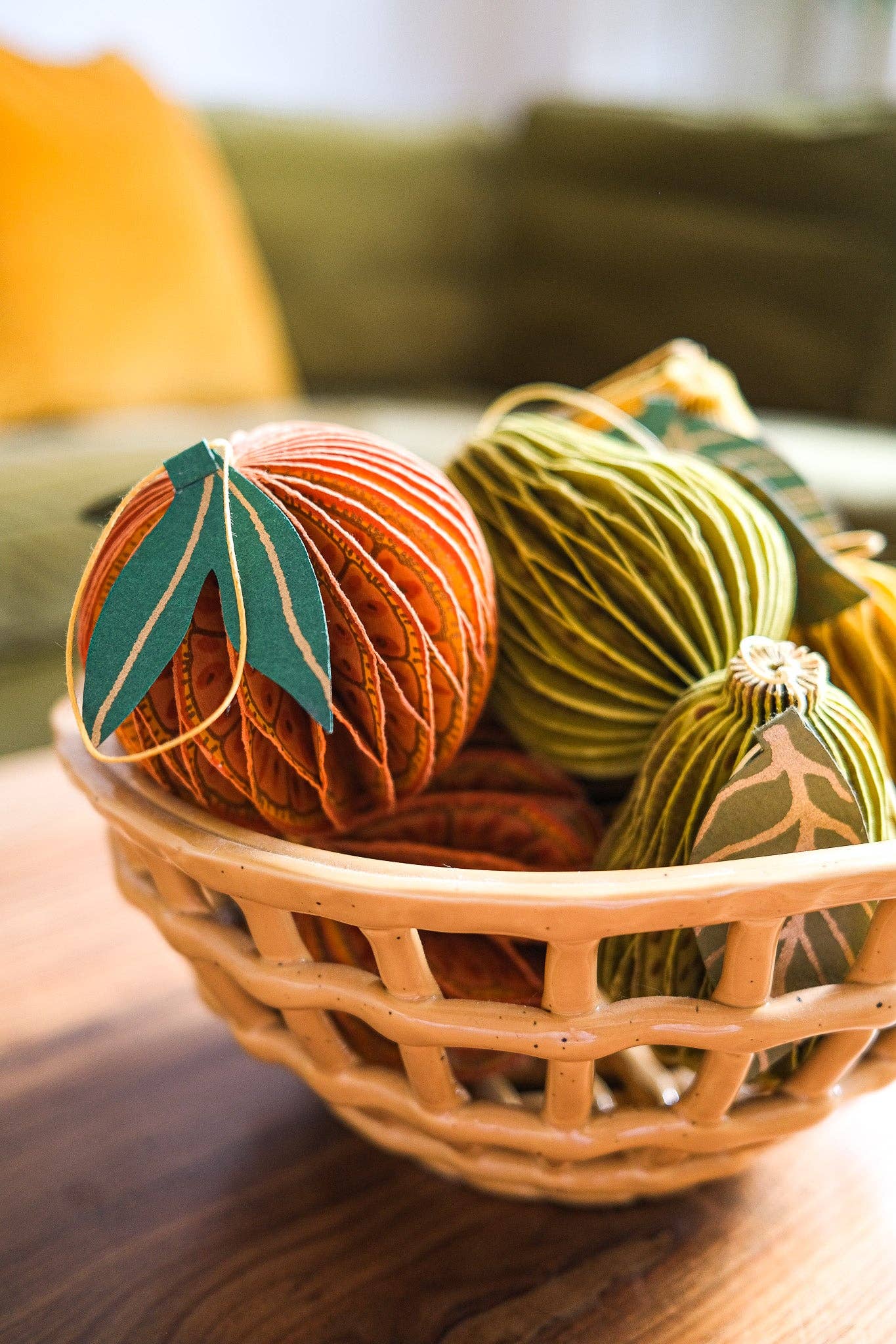 Detail of cotton hanging loop on a sustainable pear honeycomb ornament