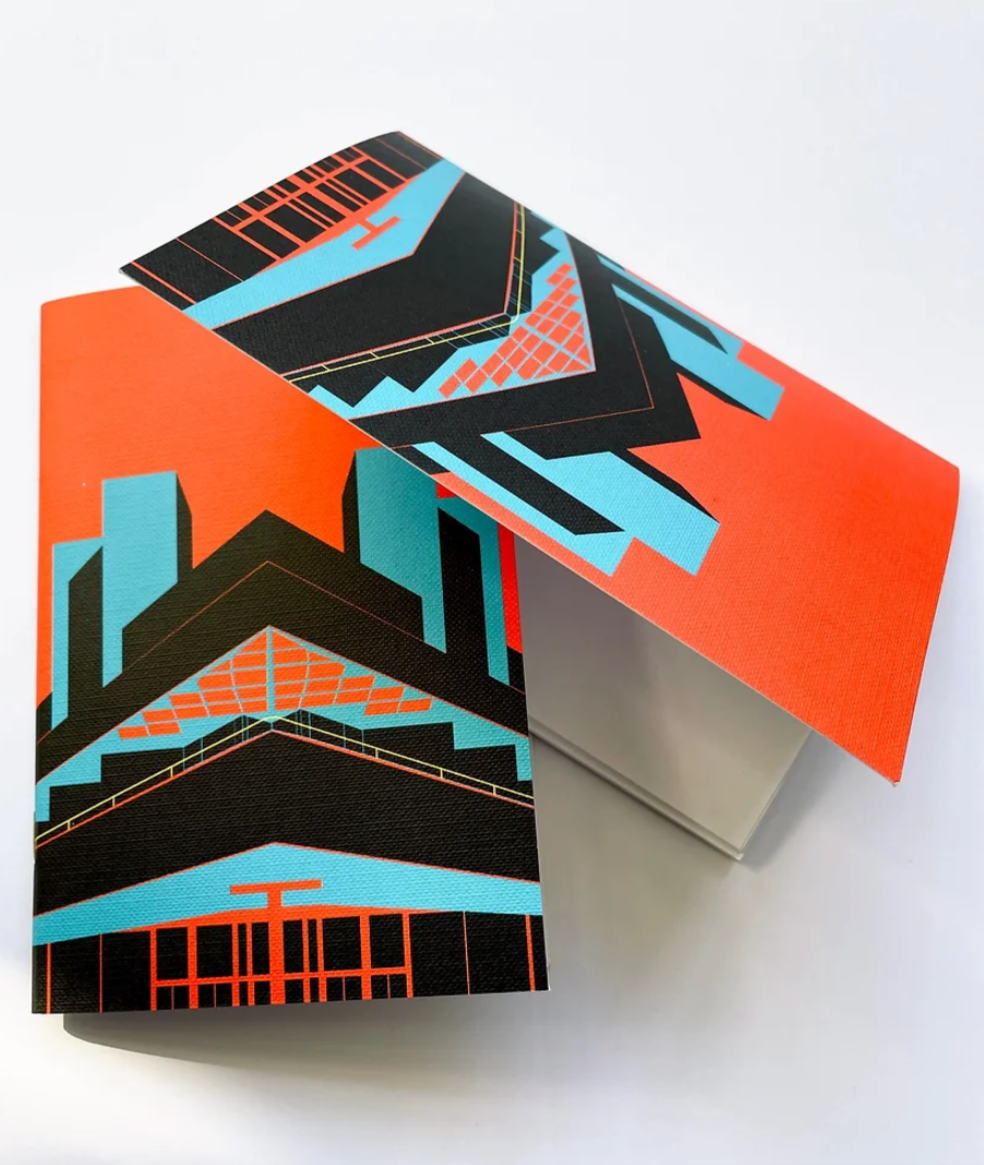 Pocket size brutalist notebooks featuring the Royal Festival Hall from Eye For London. In bold black, red, blue .