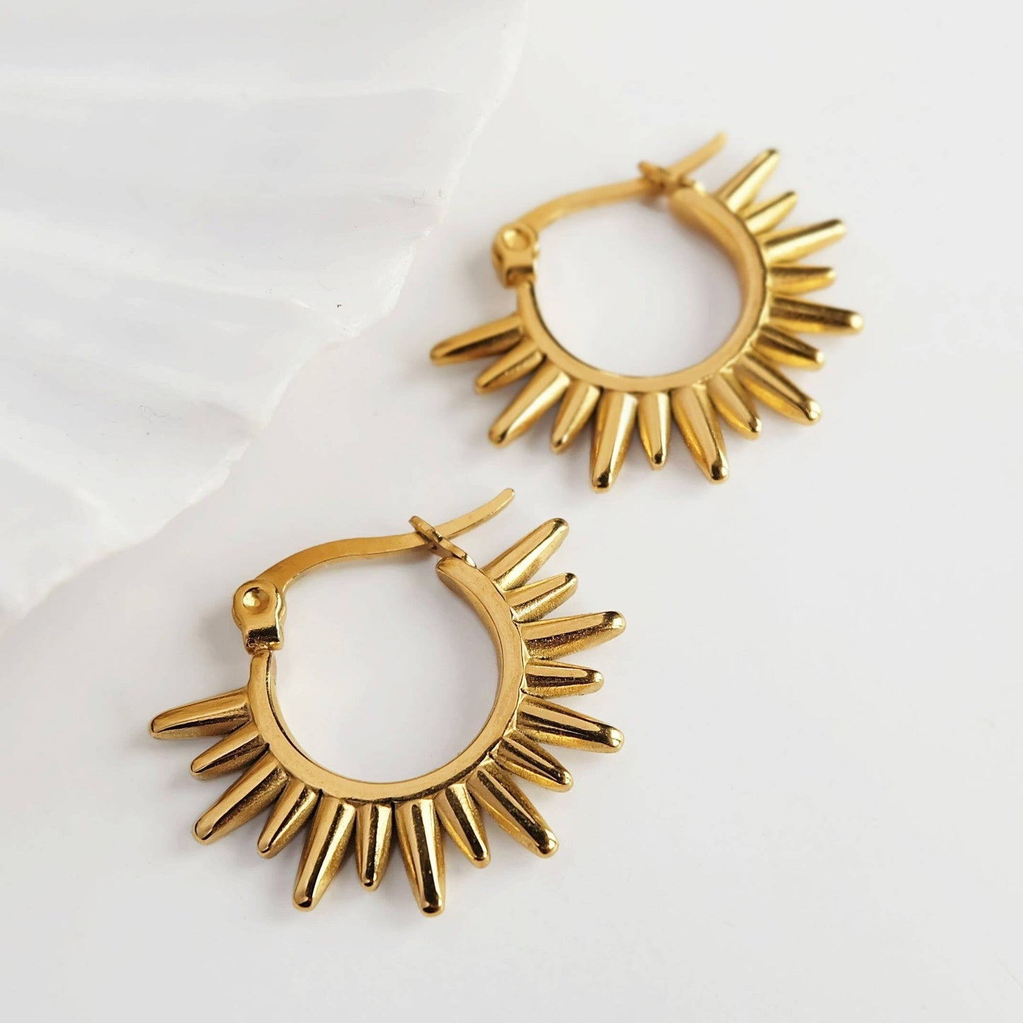 Gold Spike Sunrise Hoop Earrings on branded card