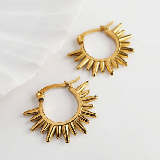 Gold Spike Sunrise Hoop Earrings on branded card