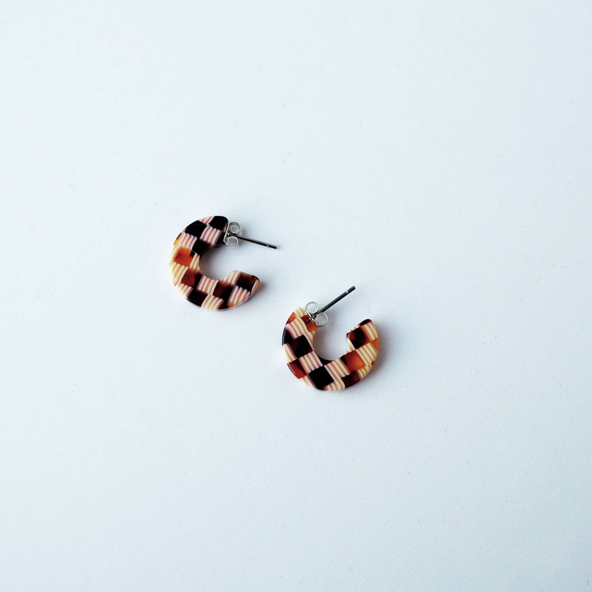 Honey Checker Mini Hoops on branded earring card