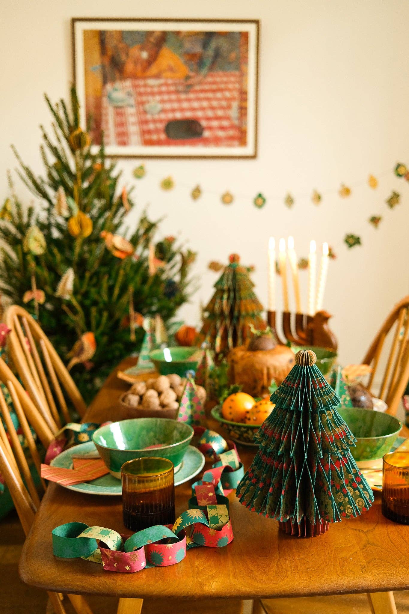 Recycled festive paper chain strips, hand-printed double-sided, eco-friendly decoration kit.