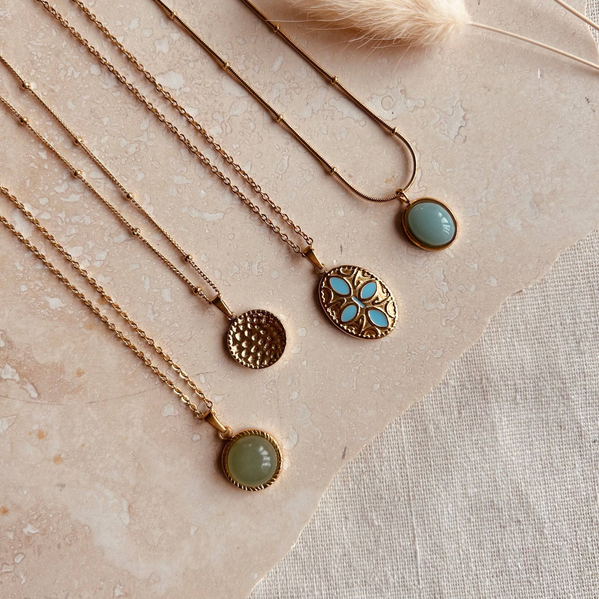Polished jade circle pendant necklace by Little Nell, water-resistant and hypoallergenic