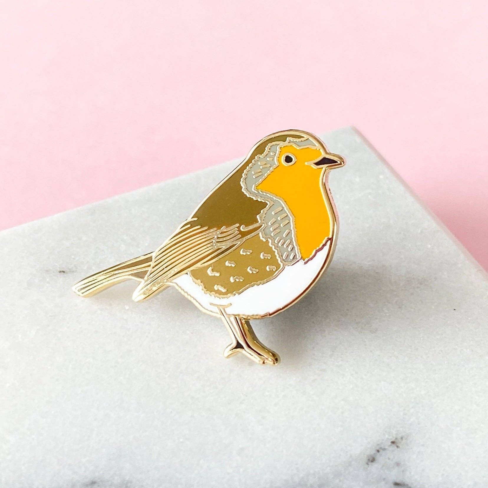 Robin enamel pin, gold metal and hard enamel, 1 inch wide, designed by Sarah Frances