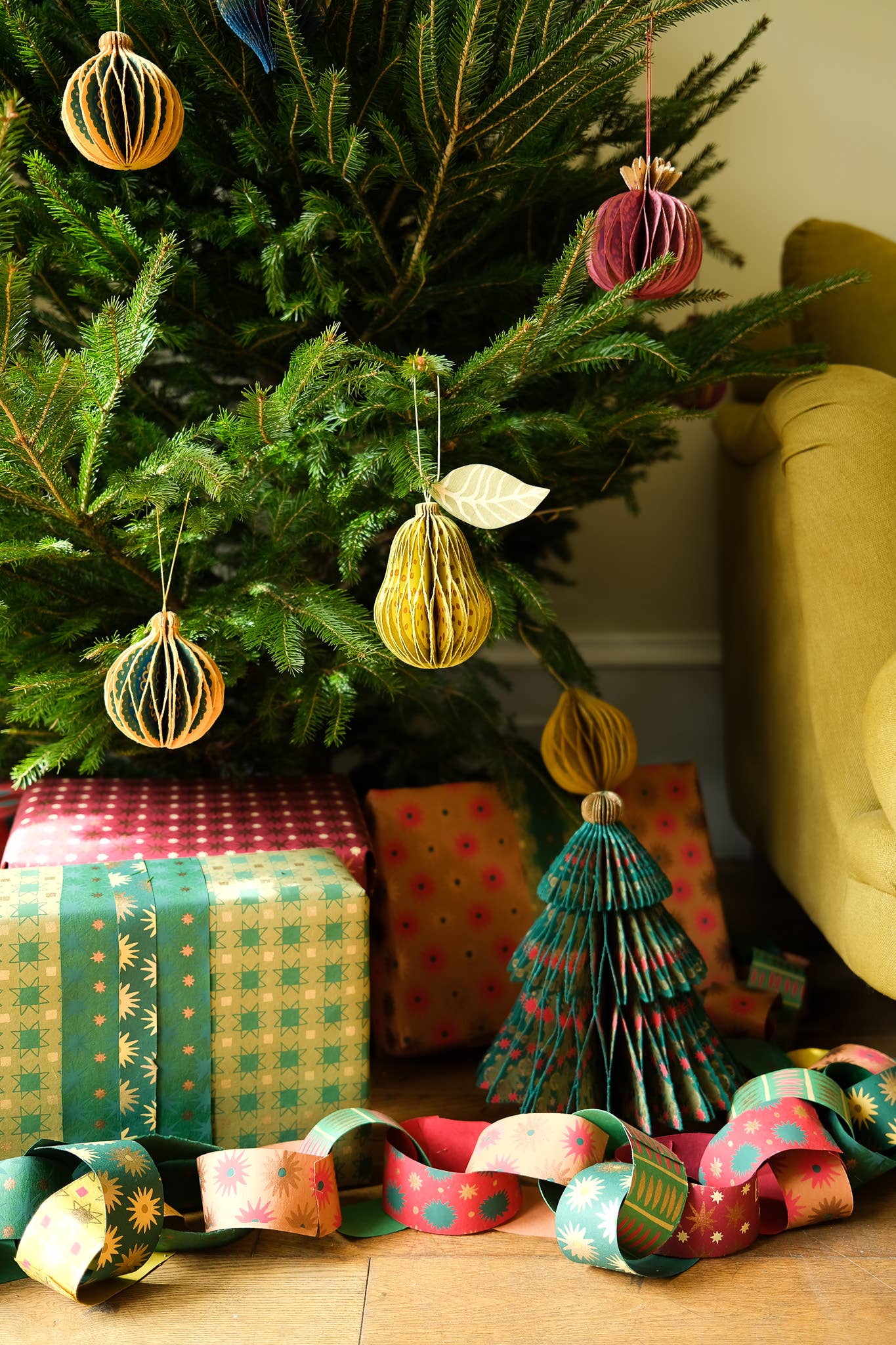 Small magnet closure visible on the recycled cotton paper pear ornament
