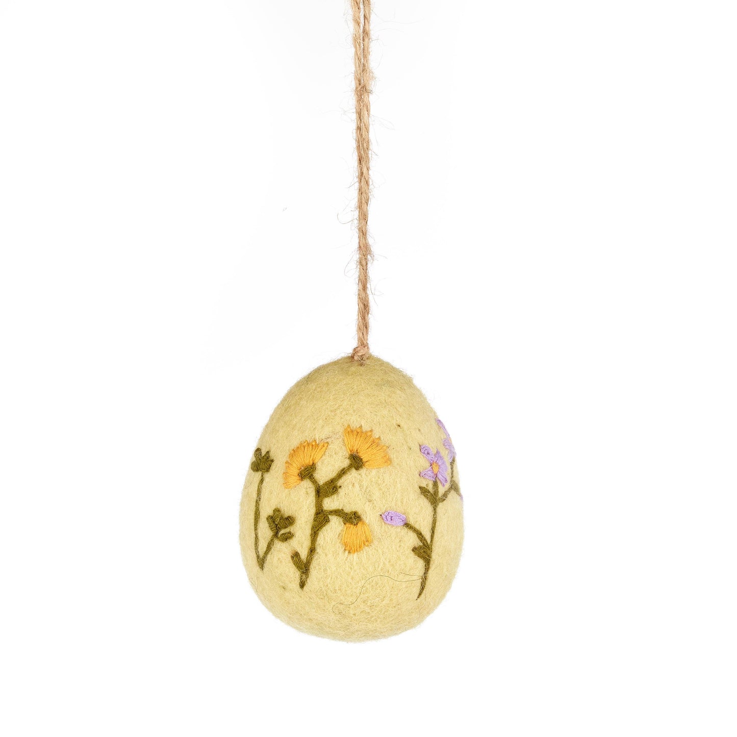 Pale yellow hand embroidered felt egg featuring delicate floral embroidery. Each egg is meticulously hand stitched, showcasing intricate details and vibrant colours that will add a touch of elegance to your home.
