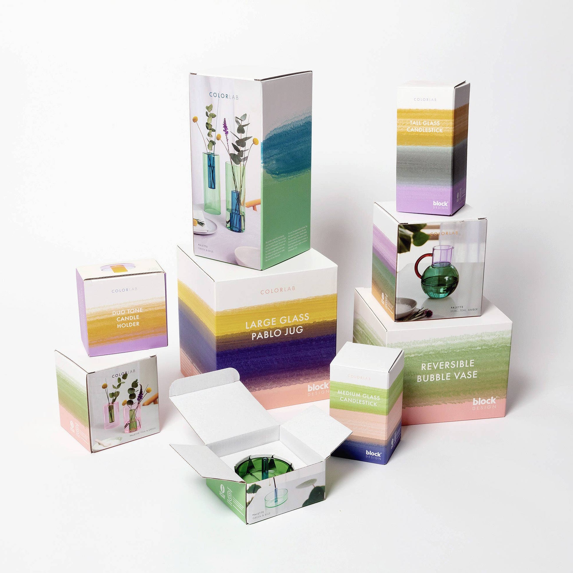 Collection of colorful product packaging boxes on a white background