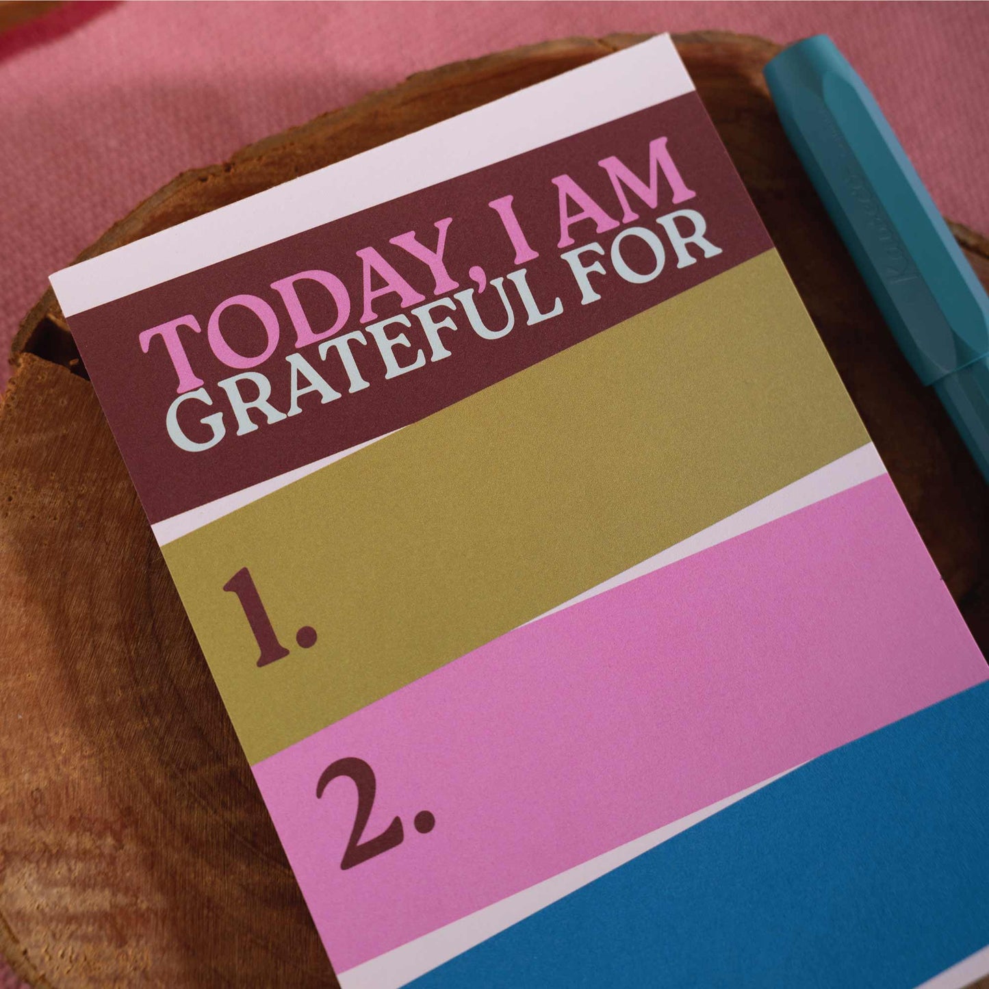 Close up of recycled paper pages on gratitude pad