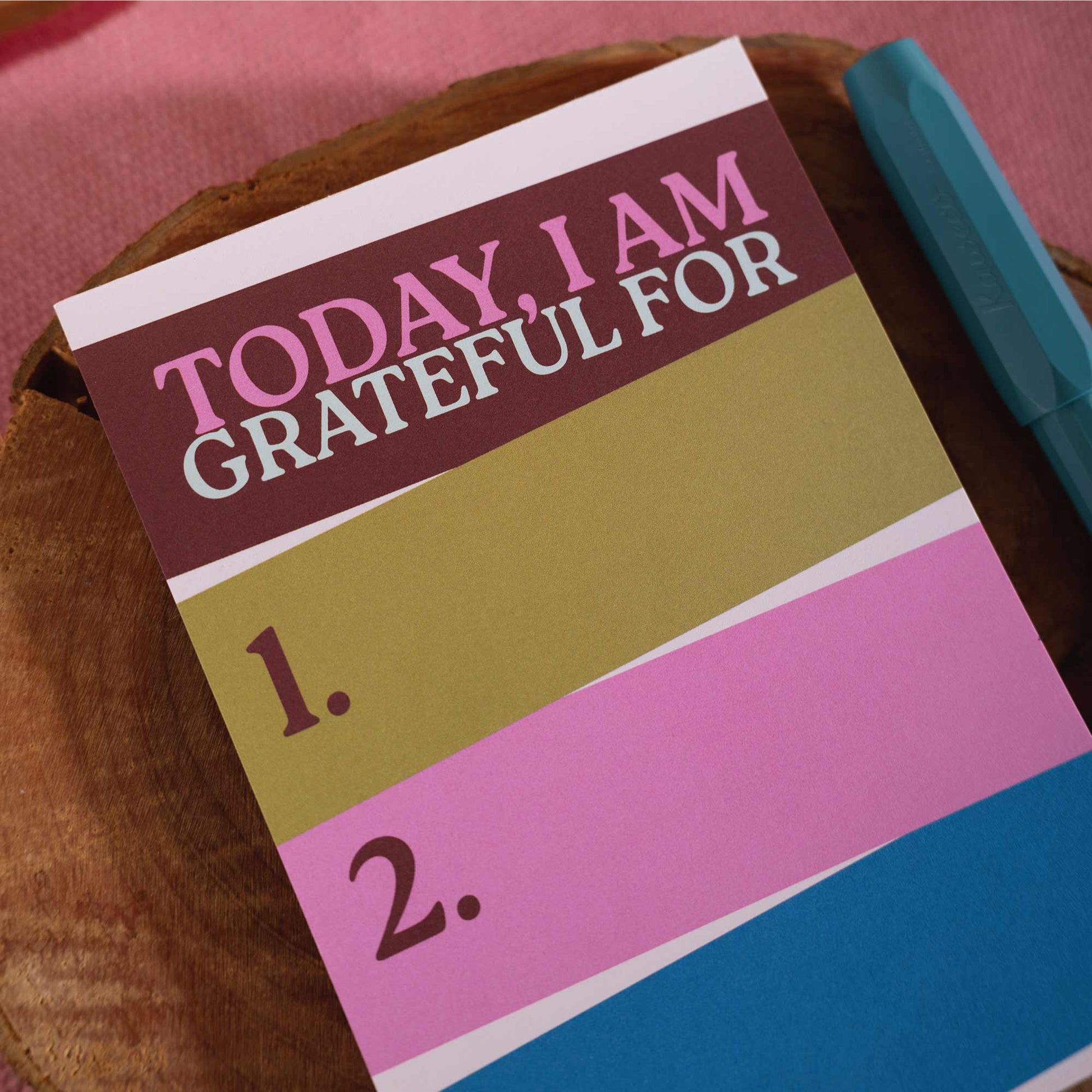 Close up of recycled paper pages on gratitude pad