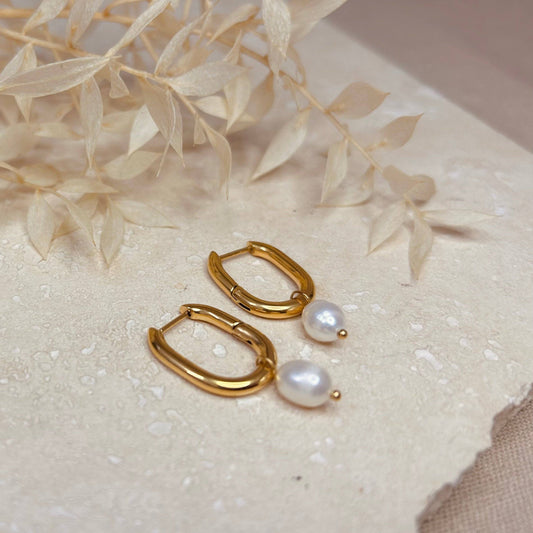 Little Nell oval hoop earrings with detachable pearl charm, gold-plated, hypoallergenic.