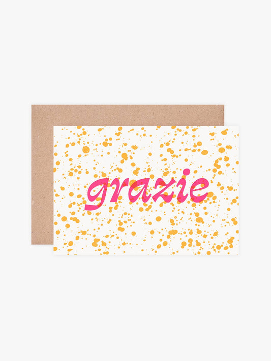 Close up of pink hot foil hand-stamped thank you card