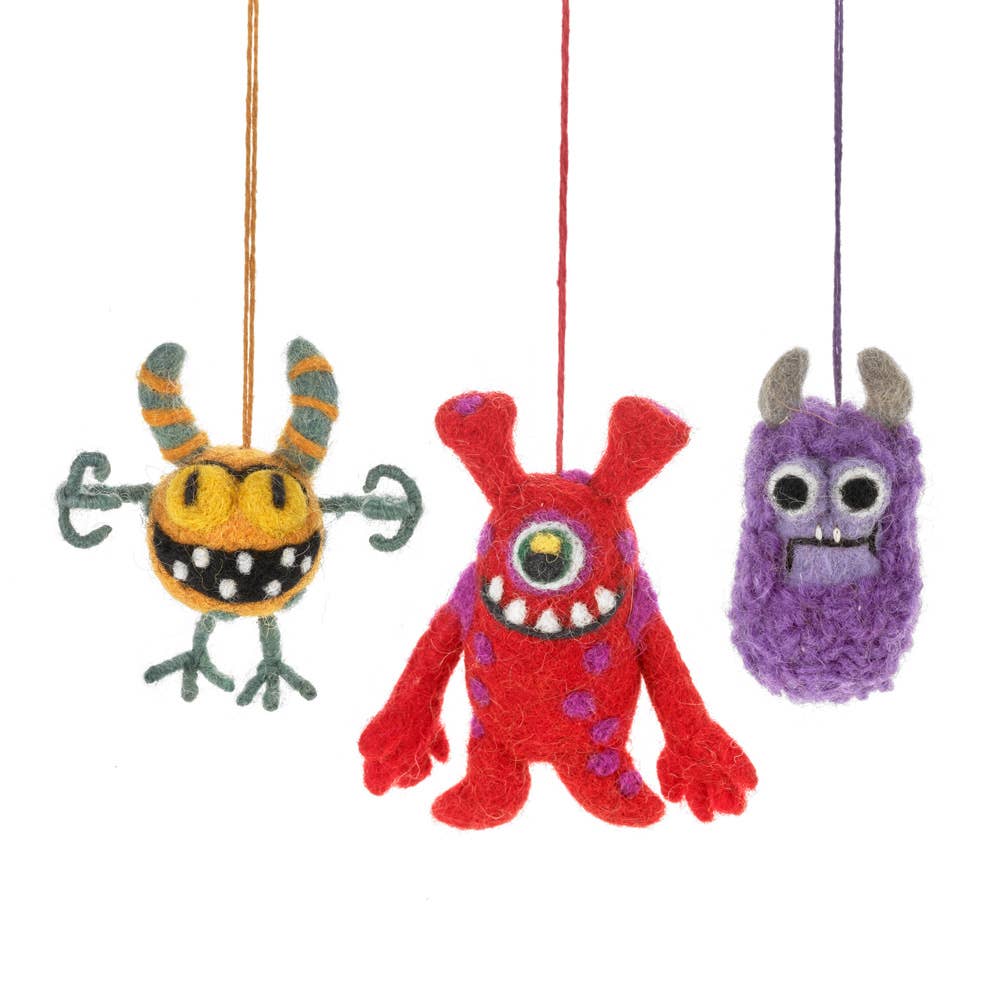 Handmade wool felt moody monster hanging decoration close up