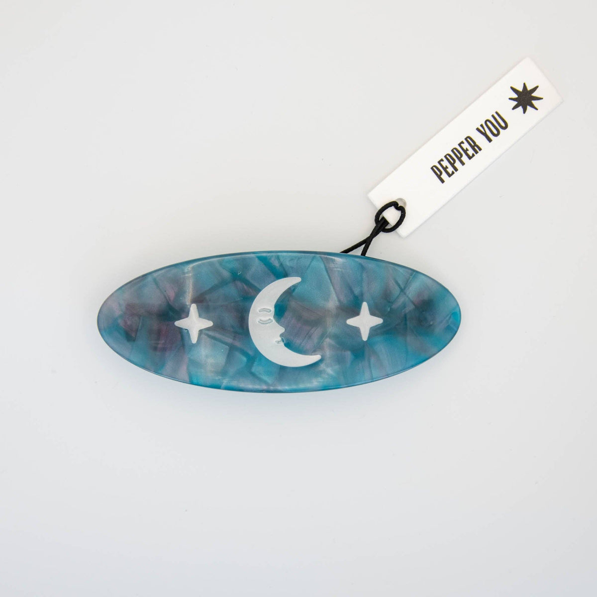 Night Sky barrette hair clip lying flat on plain background