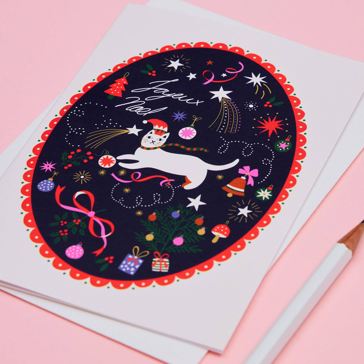 Close up of the whimsical illustrated cat Christmas card design