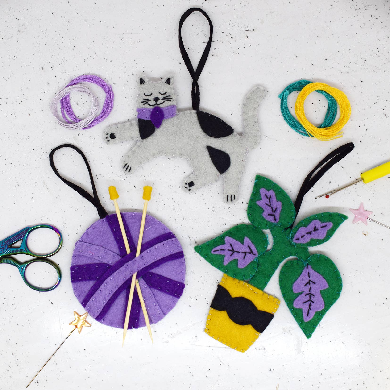 Crafty Cats Felt Stitching Set. Three felt hanging decorations. A cat, a ball of wool and a plant.